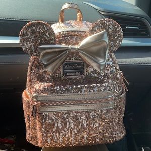 Rose gold loungefly Disney Parks collection